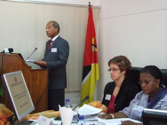 Minister Garrido delivering his speech, with Jane Rintoul and the Vice Minister on the podium 