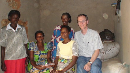 Sitting on the sorghum with Jeanne and Beatrice