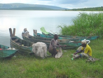 Fishermen mending their nets