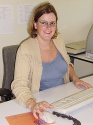 Esther at her desk in the Netherlands Embassy