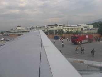 The small Port-au-Prince airport is now being clogged with aid supplies. Credit: Rebecca Sudduth