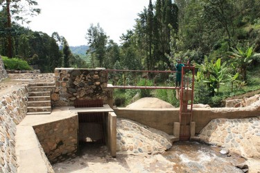 Upstream water diversion pond for refurbished 105kW micro hydro plant near Kibuye, Rwanda