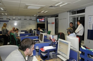 Colleagues in the DFID Operations Room respond to calls and offers of help