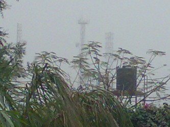 Mobile masts disappear in the Kano gloom