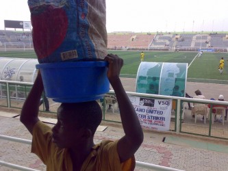 Younger hawker in stadium