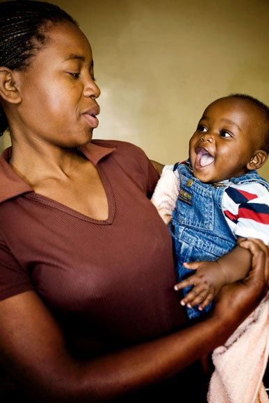 Photo of mother Farai, holding her baby