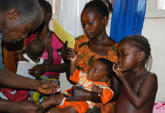 One simple jab: five-month-old Mohamed gets his vaccine in Bo, in Sierra Leone. Picture: Doune Porter/GAVI Alliance