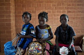 Children at a new school in Laongo, Burkina Faso take a break for lunch. Picture: Andrew Testa/Panos