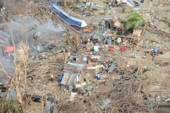 Piles of rubble and debris in Estancia in Panay Island. Picture: HMS Daring.