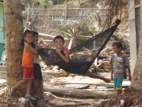 Children play in a hammock in Tanza, on Panay Island. Picture: Henry Donati/DFID.