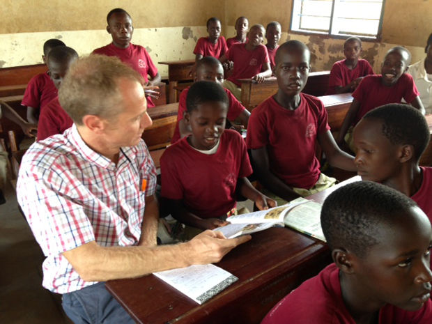 Ian sits in class with children. Picture: Ian Attfield/DFID