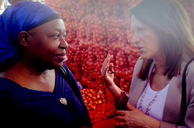 Photo: Lynne Featherstone meeting the market traders in Zimpeto, Mozambique