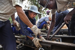 Chinese and African construction teams work together on a development project in Angola. Picutre: Dieter Telemans/Panos