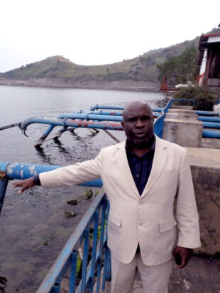 The local head of Regideso explains how water is extracted from Lake Kivu. Picture: Chris Pycroft/DFID.