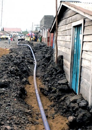 Laying pipe work in Goma. Picture: Chris Pycroft/DFID.