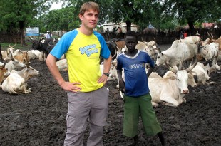 The author, and some cows. Picture: Henry Donati/DFID