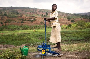 Water pump irrigating crops at the cooperative. Picture: Sam Faulkner/Comic Relief