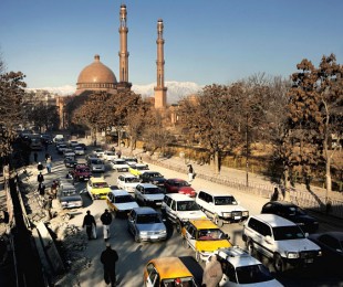 Heavy traffic in a street outside the Abdul Rahman Mosque. Picture: Christian Als/Panos