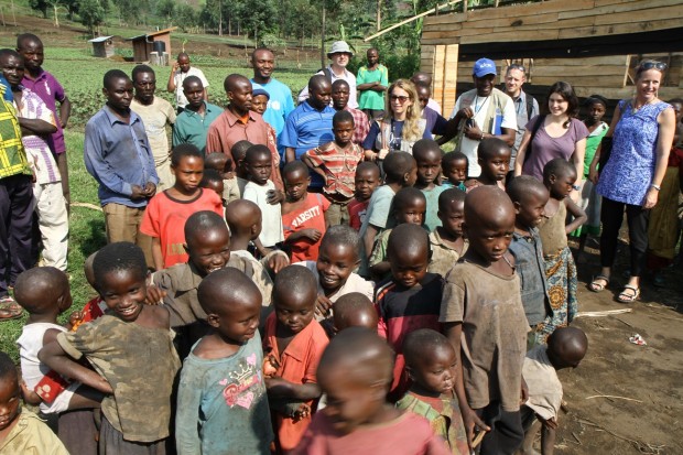 Alastair, Mischa and Charlotte visit a classroom under construction at Chondo II primary school with school children, teachers and project staff. Picture: UNICEF