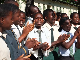 'Happy clappy’ reception from girls at Mt Darwin who are on the CAMFED programme. Picture: Paul Turner/DFID