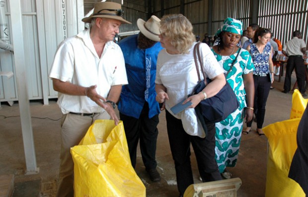 Hearing about the benefits for local formers from Grant Taylor Managing Director of Commercial Agricultural Company. Picture: Sophie Newman/DFID