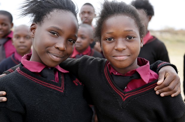 Beauty and Hope learn about their rights at school in Zambia. Picture: Jessica Lea/DFID.