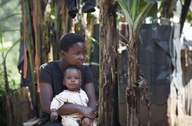 Annet, 17-years-old, Western Uganda: "I have been out of school for over a year now. I was here at home doing nothing so one of the evenings I met a man who promised to provide for me. A few weeks later I was pregnant and I went to live with him.” Picture: Rebecca Vassie/Girls Not Brides. All rights reserved.